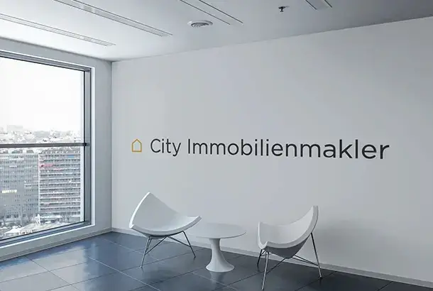 city immobilienmakler weibe wand logo